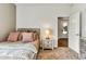 Bedroom with a neutral color scheme, comfy bed and a view of the doorway at 5793 Timber Meadow Way, St Cloud, FL 34771