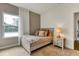 Cozy bedroom with natural light, neutral tones, and comfortable bedding at 5793 Timber Meadow Way, St Cloud, FL 34771