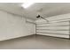 Clean, modern garage with ample space and an automatic door opener at 5793 Timber Meadow Way, St Cloud, FL 34771