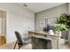 Spacious home office with a stylish desk, modern artwork, and natural light at 5793 Timber Meadow Way, St Cloud, FL 34771