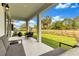 Relaxing outdoor patio area with lush landscaping and serene views at 5793 Timber Meadow Way, St Cloud, FL 34771