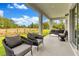 Stylish patio with comfortable seating, perfect for outdoor entertaining at 5793 Timber Meadow Way, St Cloud, FL 34771