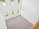 Large bedroom features plush carpeting, three windows, and ample natural light at 2199 Broadbrook Drive, St Cloud, FL 34771