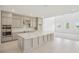 Stylish kitchen featuring granite countertops, stainless steel appliances, and ample cabinet space at 2199 Broadbrook Drive, St Cloud, FL 34771
