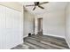 Bedroom featuring ceiling fan and wood-look flooring at 2902 Wheeler St, Bartow, FL 33830
