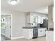 Charming room with a ceiling fan and laminate flooring, featuring an open walk-in closet and bathroom doorway at 2902 Wheeler St, Bartow, FL 33830