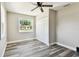 Bright bedroom with ceiling fan and closet at 2902 Wheeler St, Bartow, FL 33830