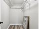 A well organized walk-in closet with multiple shelves and ample storage space at 2902 Wheeler St, Bartow, FL 33830