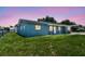 Charming single-story home with a well-maintained lawn and cozy front porch at 2902 Wheeler St, Bartow, FL 33830