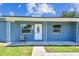 Inviting front porch with a chair, providing a welcoming entrance to the home at 2902 Wheeler St, Bartow, FL 33830