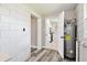 Hallway with view into kitchen at 2902 Wheeler St, Bartow, FL 33830