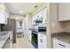 Updated kitchen with modern appliances, granite counters, and freshly painted cabinets at 2902 Wheeler St, Bartow, FL 33830