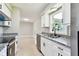 Open-concept kitchen with modern appliances, granite countertops, and ample storage space at 2902 Wheeler St, Bartow, FL 33830