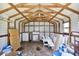 This home's shed has wood framing and corrugated metal walls, with a wood floor at 2902 Wheeler St, Bartow, FL 33830