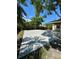 Inviting backyard space showcasing a concrete patio area, perfect for outdoor activities and shaded by leafy trees at 3802 Bryston Dr, Orlando, FL 32822