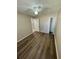 Bedroom features vinyl flooring, a ceiling fan, and a closet at 3802 Bryston Dr, Orlando, FL 32822