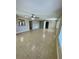 Open floor plan with tile flooring and ceiling fans in a spacious layout at 3802 Bryston Dr, Orlando, FL 32822