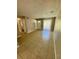 Bright living room featuring tile floors and natural light from a large window at 3802 Bryston Dr, Orlando, FL 32822