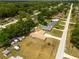 Aerial view highlighting the property's layout within a quiet residential neighborhood at 21078 Sw Honeysuckle St, Dunnellon, FL 34431