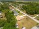 Aerial view of the property highlighting its location within a quiet neighborhood at 21078 Sw Honeysuckle St, Dunnellon, FL 34431