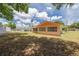 Spacious backyard featuring a shed, and plenty of grassy area, great for outdoor activities at 21078 Sw Honeysuckle St, Dunnellon, FL 34431