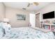 Bedroom featuring ceiling fan, picture on the wall and decor at 3321 Pintello Ave, New Smyrna Beach, FL 32168