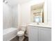 Bright bathroom featuring a tub, new toilet and vanity at 781 Poppy Ln, Dundee, FL 33838