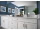 Elegant bathroom showcasing a double vanity with quartz countertop and modern fixtures at 6200 Sw 97Th St, Ocala, FL 34476