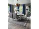 Elegant dining room with a round table, stylish chairs, and modern decor at 6200 Sw 97Th St, Ocala, FL 34476