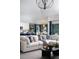 Bright living room open to kitchen and dining, showcasing a spacious and modern design at 6200 Sw 97Th St, Ocala, FL 34476