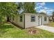 Charming home with a fresh exterior and a well-kept yard, perfect for suburban living at 833 N Suwannee Ave, Lakeland, FL 33815