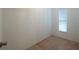 Cozy bedroom features neutral carpet and ample natural light at 1074 Canary S Cir, Lakeland, FL 33809