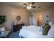 Spacious main bedroom featuring a vaulted ceiling, neutral tones, and an open walk-in closet at 1074 Canary S Cir, Lakeland, FL 33809