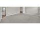 Bright and spacious bedroom with neutral walls and plush carpeting throughout at 879 Astor Way, The Villages, FL 32162