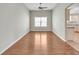 Bright living room featuring laminate flooring and natural light at 879 Astor Way, The Villages, FL 32162