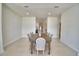 Spacious dining room featuring a long table with seating for ten and recessed lighting at 359 Terminal Ave, Polk City, FL 33868