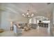 Inviting living room featuring modern decor, open floor plan, and seamless connection to the kitchen at 359 Terminal Ave, Polk City, FL 33868