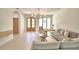 Spacious living room featuring modern decor, stylish furniture, and open layout at 359 Terminal Ave, Polk City, FL 33868