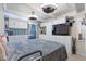 Bright bedroom with built-in storage and a window bringing in plenty of light at 4709 Club Cir, Lakeshore, FL 33854