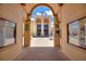 Inviting entryway to the clubhouse with bulletin boards and seating at 4709 Club Cir, Lakeshore, FL 33854