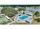Overhead shot of the community pool area with ample seating and recreation at 4709 Club Cir, Lakeshore, FL 33854