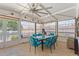 Bright dining area with tile floors, large windows, and ample seating at 4709 Club Cir, Lakeshore, FL 33854