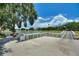 Community fishing dock, a park with benches and a lake view; a great place to enjoy the outdoors at 4709 Club Cir, Lakeshore, FL 33854