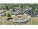 Picturesque fire pit area perfect for entertaining and enjoying the outdoors at 4709 Club Cir, Lakeshore, FL 33854