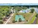 A high angle view of community recreation space, with basketball court and path at 4709 Club Cir, Lakeshore, FL 33854