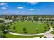 Enjoy the outdoors in this community featuring well-maintained greenery and a community park at 5660 Elsinore Way, Lakeland, FL 33805