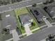 Aerial view of a beautiful two-story home with manicured lawn, fenced yard, and a convenient location at 5660 Elsinore Way, Lakeland, FL 33805