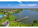 The beautiful community boasts a lake with a fishing pier, pool, playground, and well-manicured landscaping at 5660 Elsinore Way, Lakeland, FL 33805