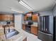Well-equipped kitchen featuring granite countertops, stainless steel appliances, and ample cabinet space at 5660 Elsinore Way, Lakeland, FL 33805