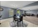 Open concept living space featuring dining area connected to living room at 5660 Elsinore Way, Lakeland, FL 33805